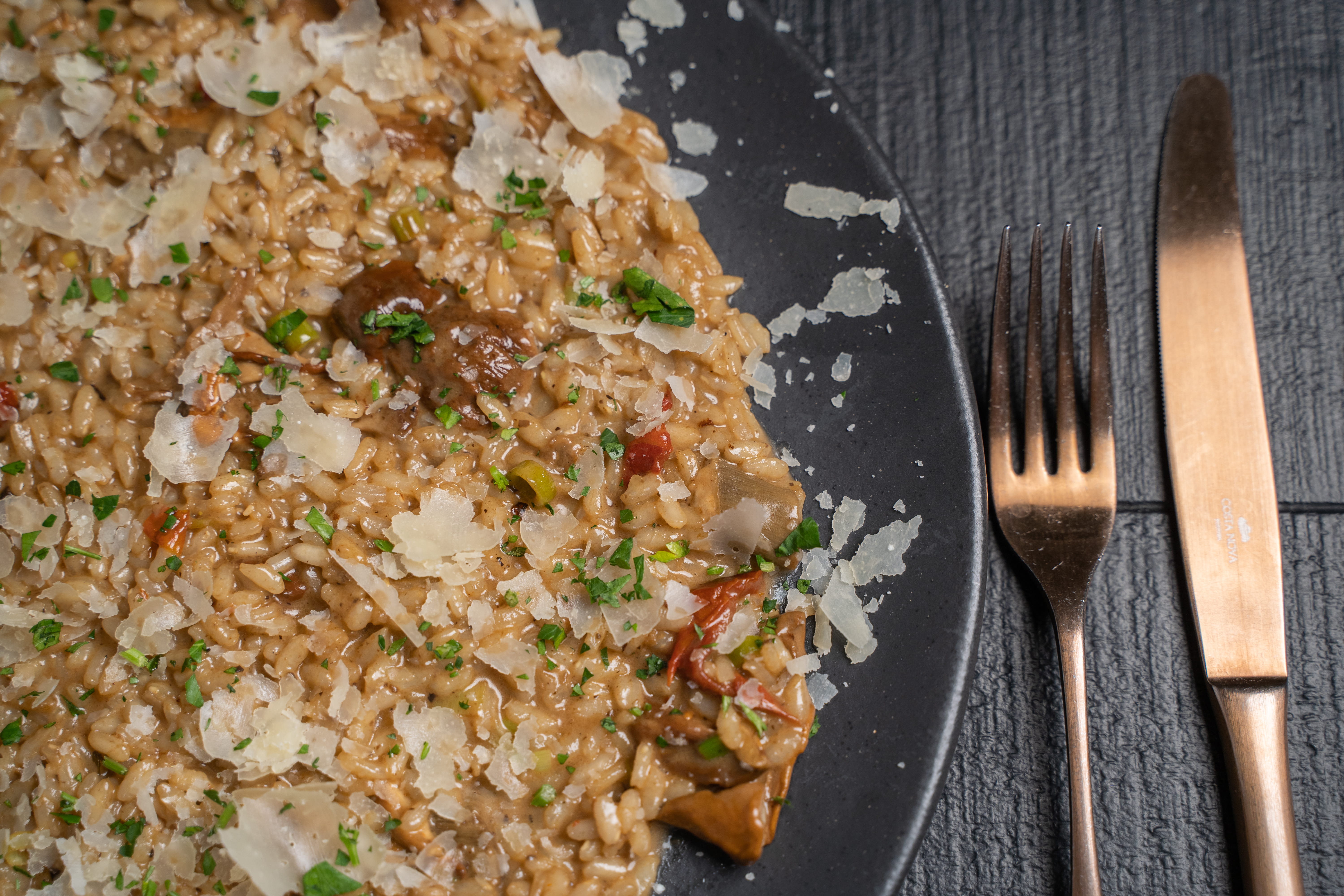 Risotto i tartufo nero e funghi porcini